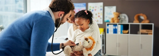 Doctor Checking Girl's Stuffed Animal