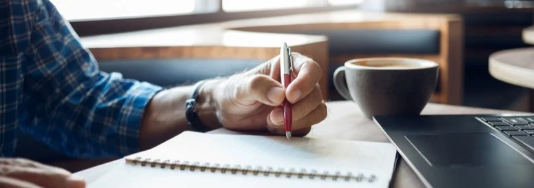 A person taking notes