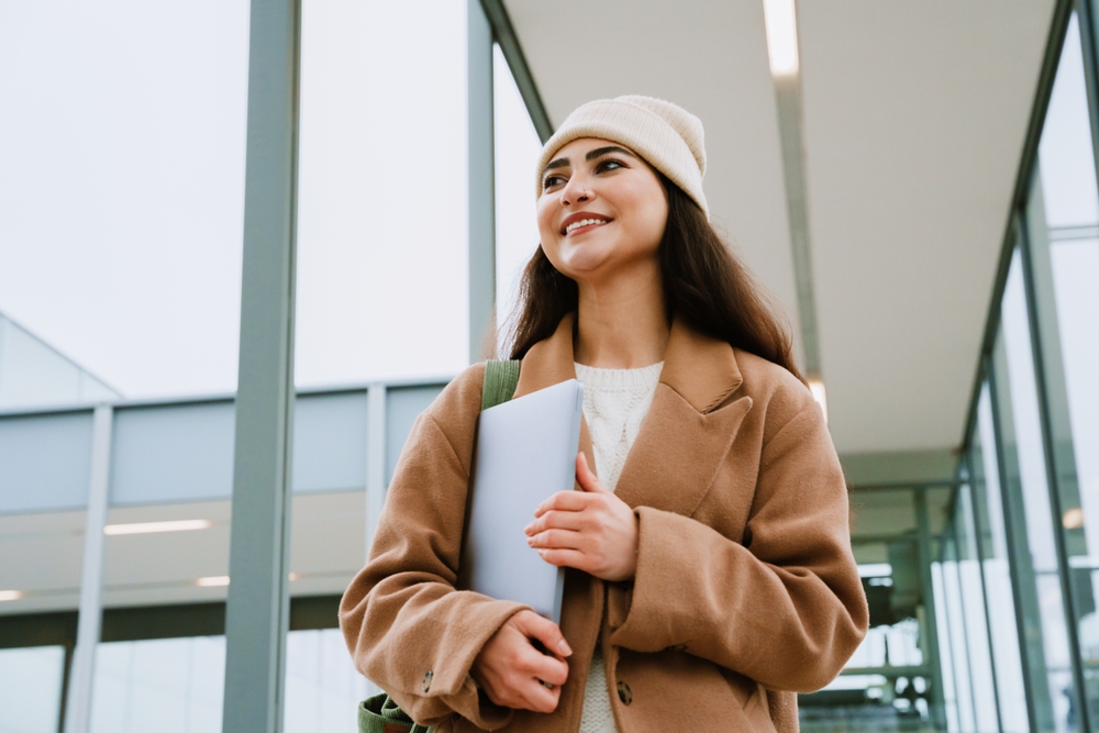 college-student-holding-laptop