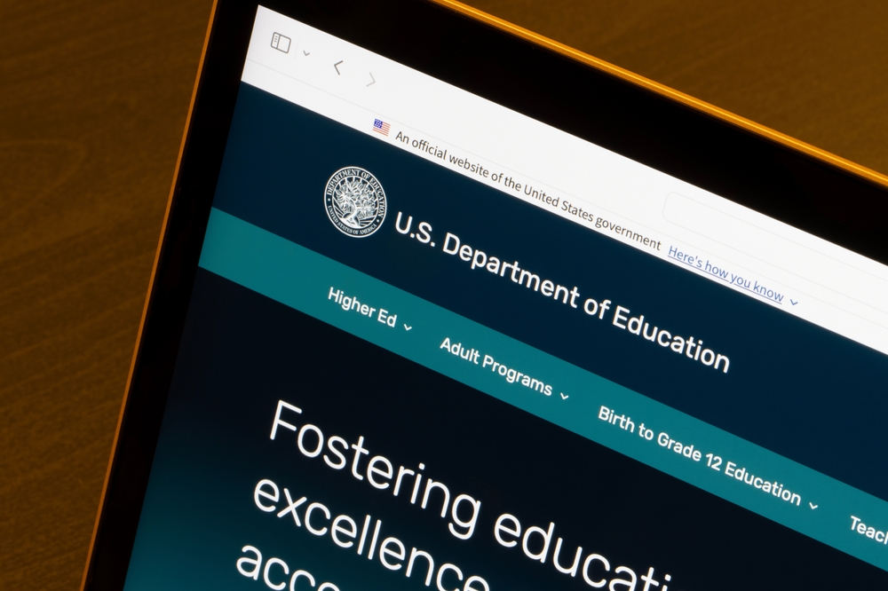 Laptop showing the Department of Education website